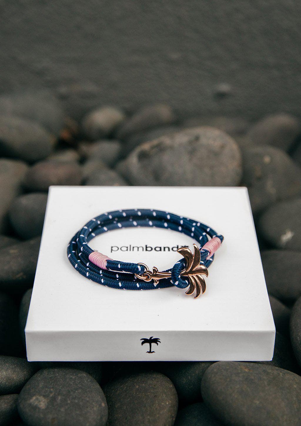 Daybreak - Triple - Season two Palm anchor bracelet with pink and blue nylon band. On palm band box.