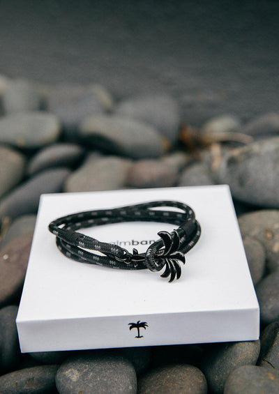Phantom Black - Triple - Season two Palm anchor bracelet with black and grey nylon band. In the palm band box.