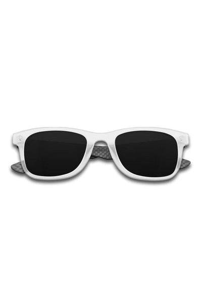Hybrid - Atom, carbon fiber and acetate sunglasses of the highest quality. Transparent frame with black lenses.