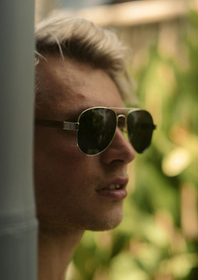 Eyewood Aviators - Falcon - Wooden sunglasses on model in Bali