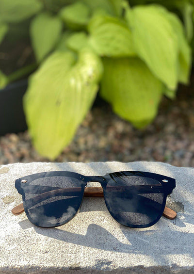Eyewood tomorrow is our modern cool take on classic models. This is Fornax with black lenses. With walnut wooden sides. Taken outside in the Swedish summer.