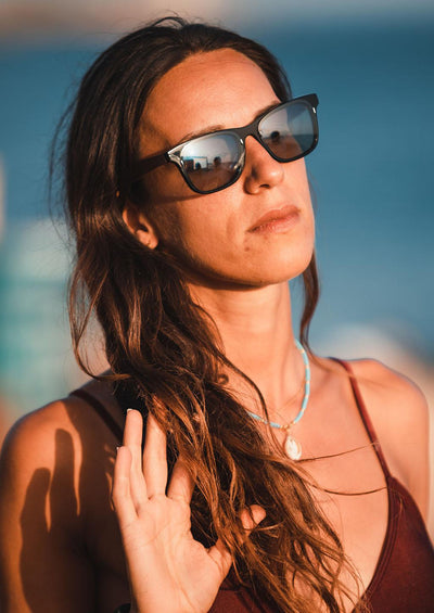 Our handmade Eyewood ReInvented Wooden and Acetate Sunglasses. This is our wayfarer style. Another photo on a female Italien model.