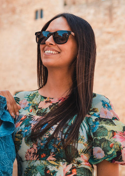 Our handmade Eyewood ReInvented Wooden and Acetate Sunglasses. This is our wayfarer style. On a Italien female model.