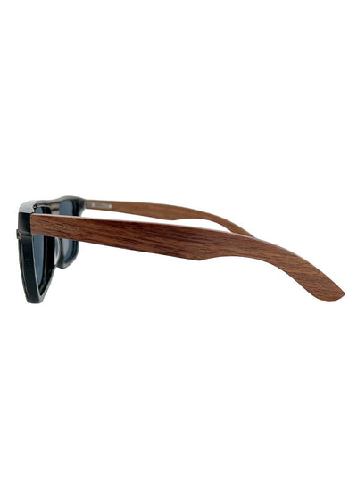 Our handmade Eyewood ReInvented Wooden and Acetate Sunglasses. This is our wayfarer style. Studio photo from the side.