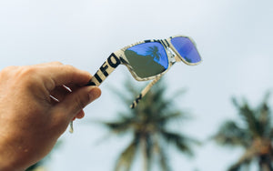 Eco-friendly paper sunglasses with polarized lenses.