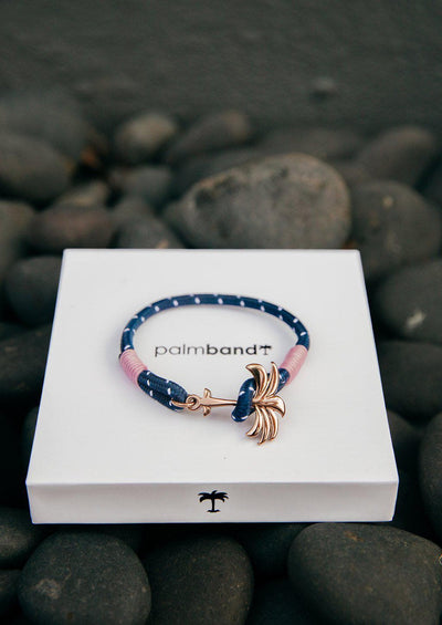 Daybreak - Single - Season two Palm anchor bracelet with pink and blue nylon band. On palm band box.