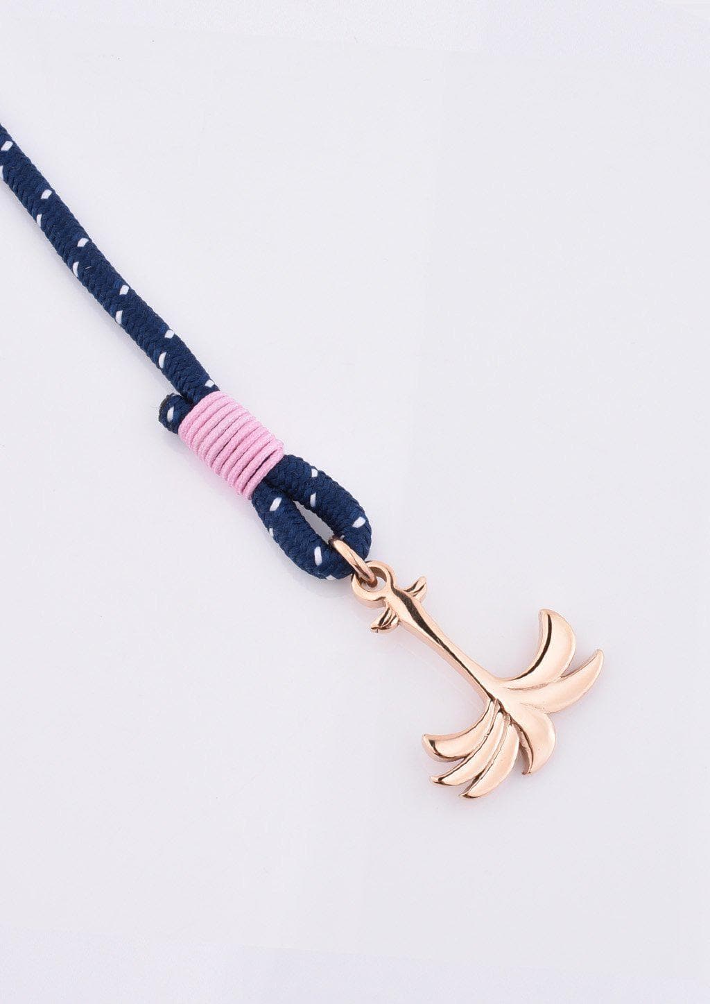 Daybreak - Single - Season two Palm anchor bracelet with pink and blue nylon band. Close up with details.