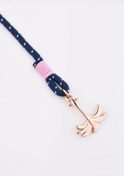 Daybreak - Triple - Season two Palm anchor bracelet with pink and blue nylon band. Close up with details.
