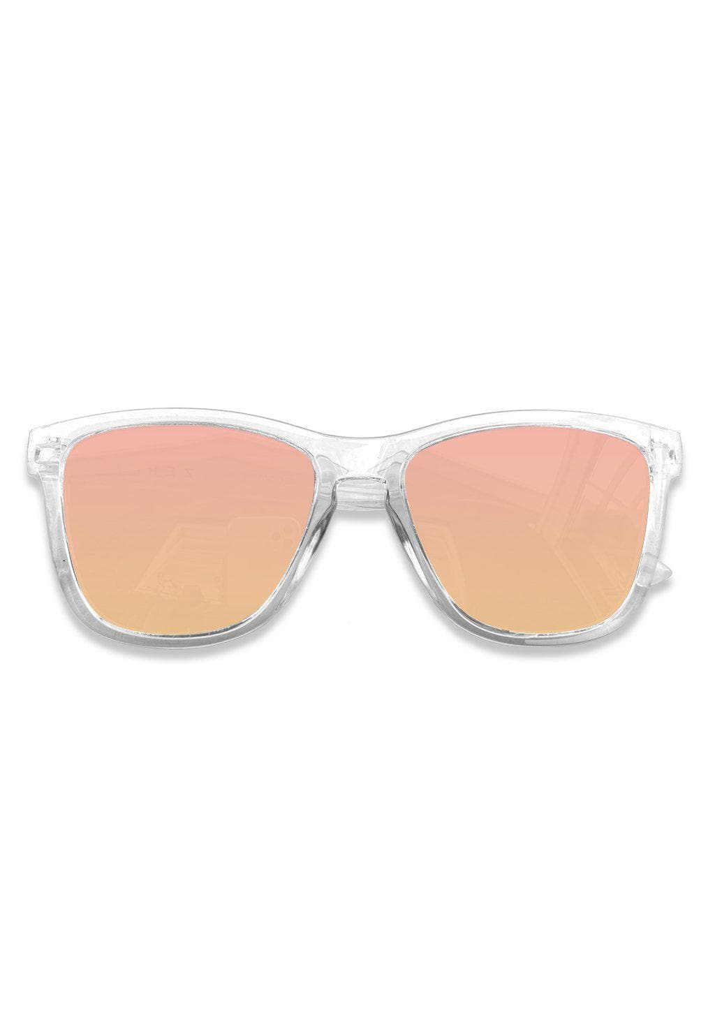 Our Mood V2 is an improved version of our last wayfarers. Plastic body for great quality and durabilty. This is Firefly with a transparent frame and rosé mirror lenses. From the front.