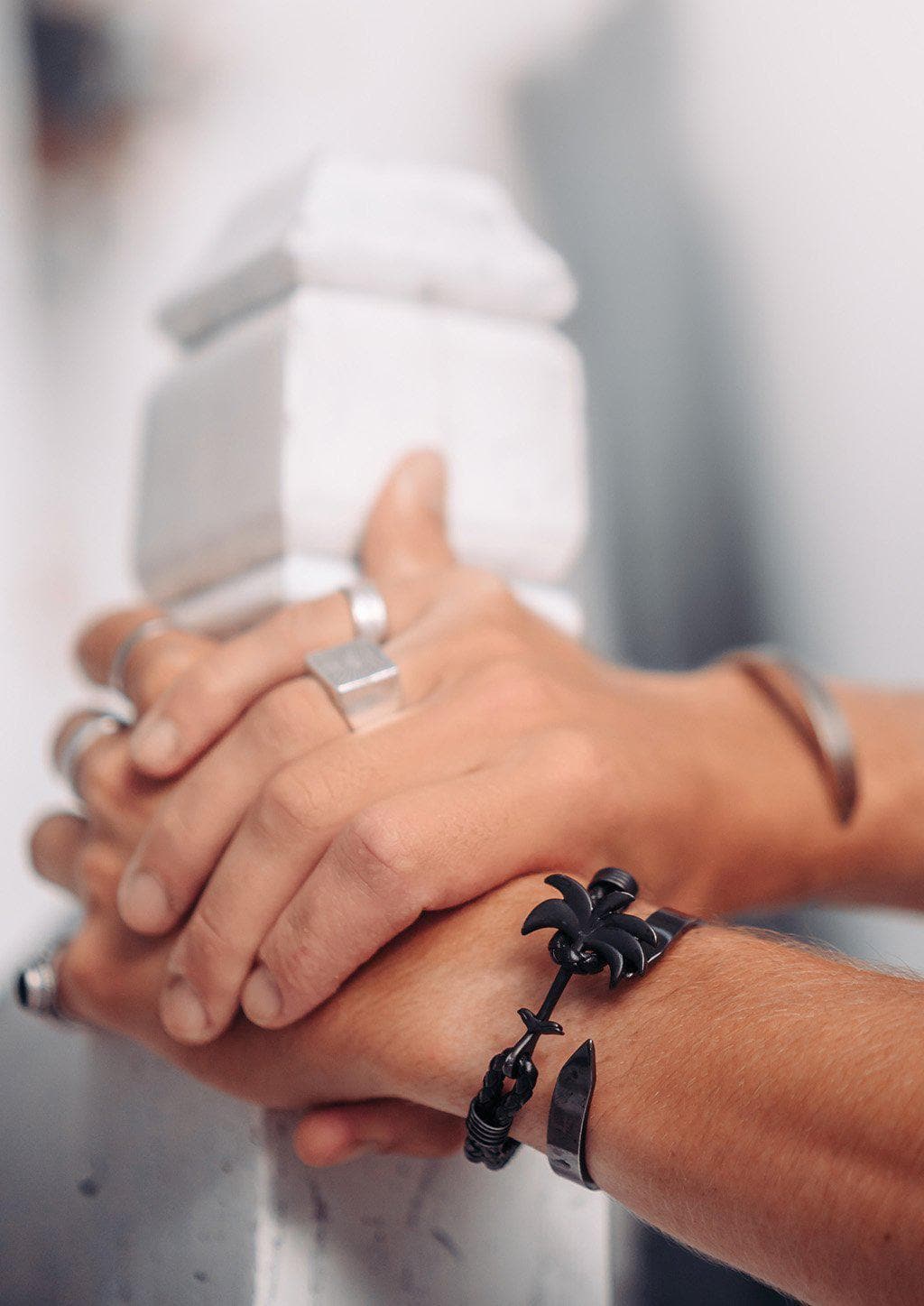 Pitch Black - Palm anchor bracelet with black leather. On a models wrist.