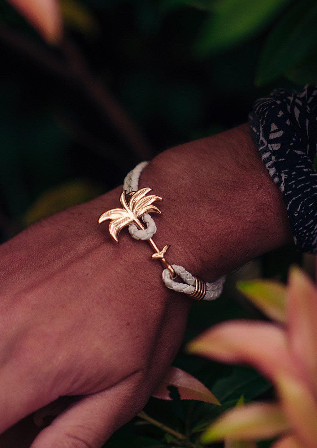Paradise Rose - Palm anchor bracelet with white leather. On model wrist.