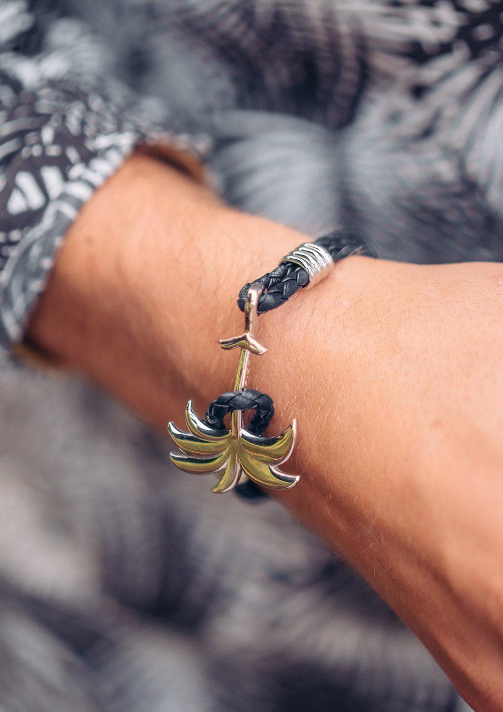 Twilight Silver - Palm anchor bracelet with black leather. On male models arm.