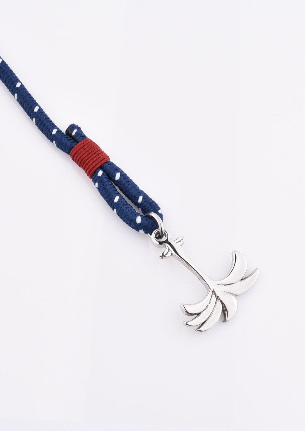Voyager - Triple - Season two Palm anchor bracelet with blue and red nylon band. Close up on palm.