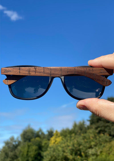Engraved wooden sunglasses Inspired by the computers and the programing languages. A close up on the back with all the details.