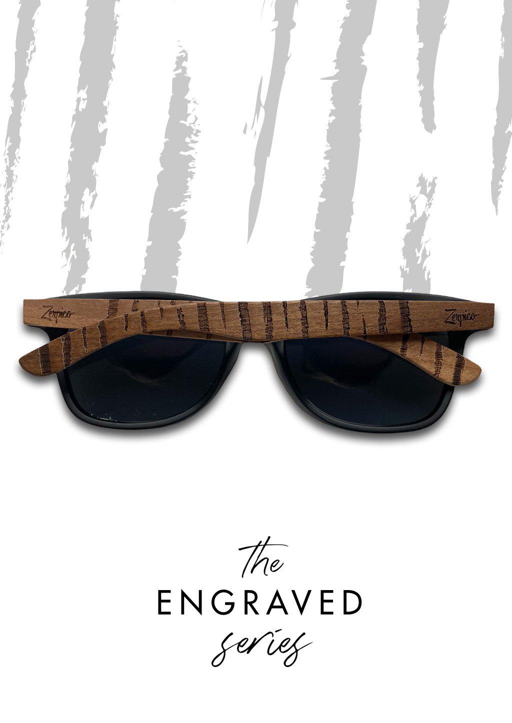 Engraved wooden sunglasses inspired by the untamed tigers and lions.