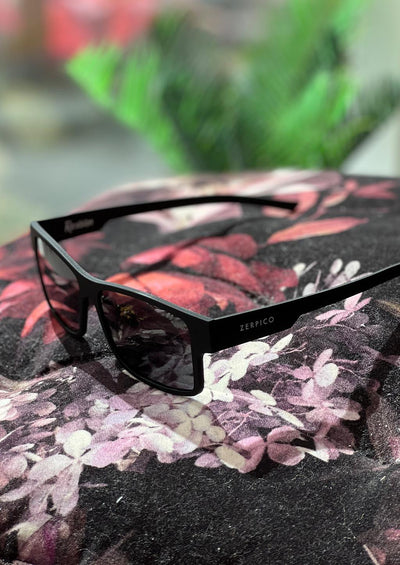 ReVision Square - Eco-Friendly Recyclable Paper Sunglasses, with our black frame and black lenses.