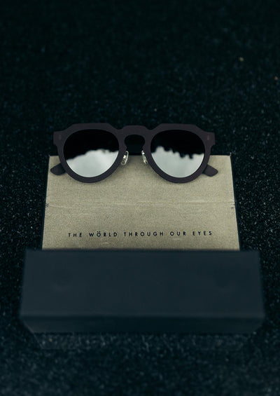 ReVision Round - Eco-Friendly Recyclable Paper Sunglasses with our foldable vegan leather box.