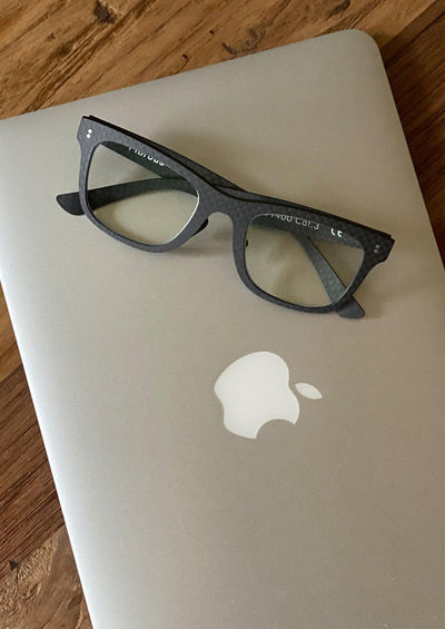 Our Anti Blue Light version of our Fibrous Carbon Fiber glasses. Perfect for gamers. Working on the computer.