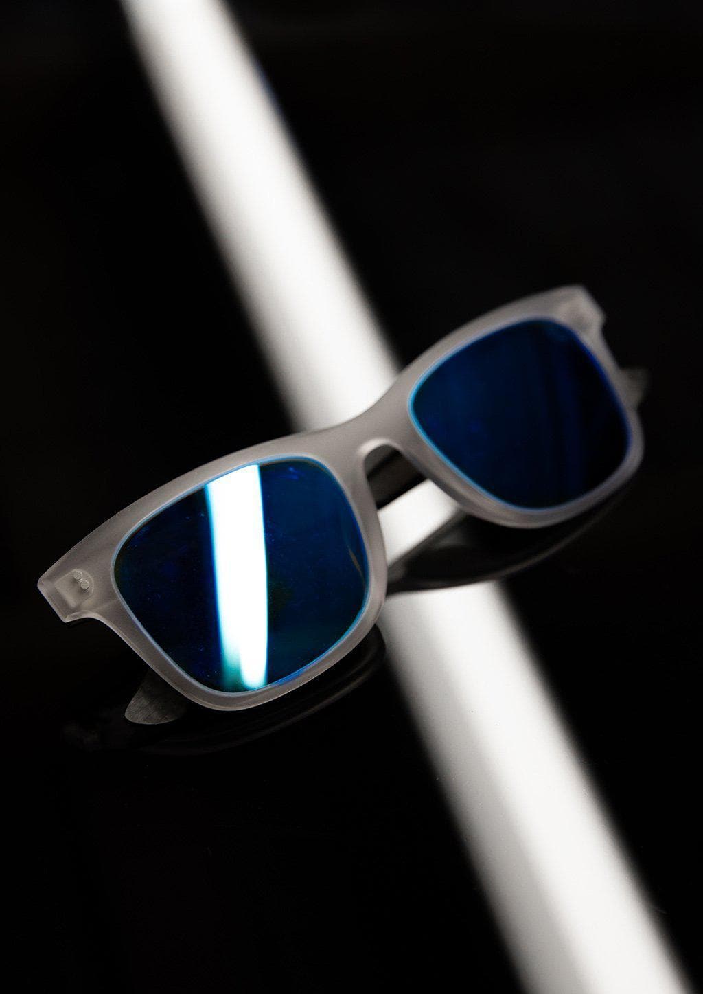 Hybrid - Atom, carbon fiber and acetate sunglasses of the highest quality. Studio shoot of transparent frame.