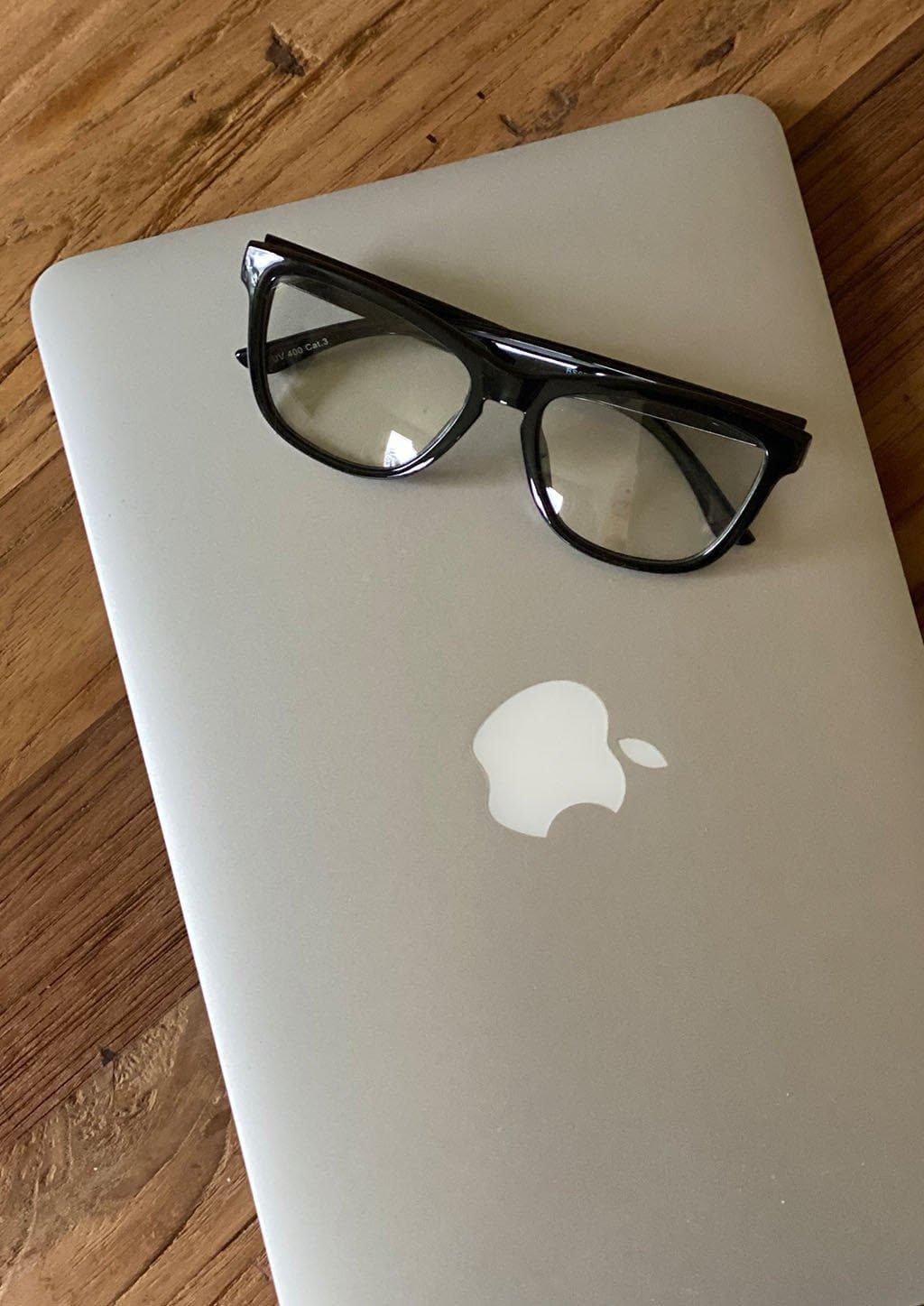 Our Photochromic anti bluelight black glasses that work like two in one. Turns dark in the sun and clear inside.  Works perfect for work and gaming.