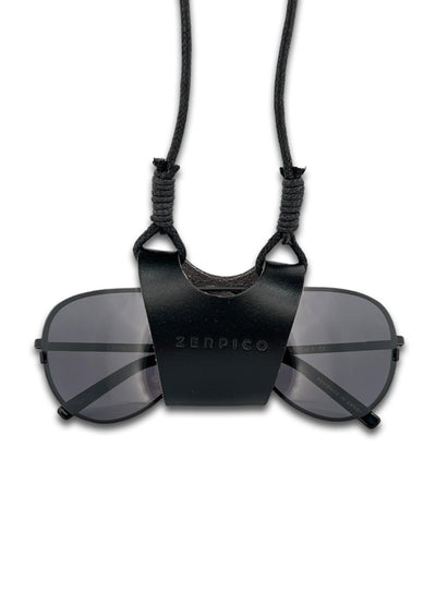 Sunglasses carrier that will keep your sunglasses around your neck. In black leather.