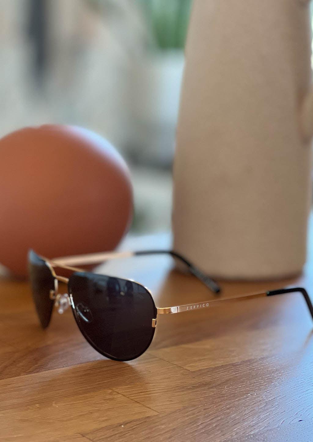 Titan - Titanium Aviator Sunglasses V2 - 24K Gold Plated with real gold. Photo taken in Swedish home.