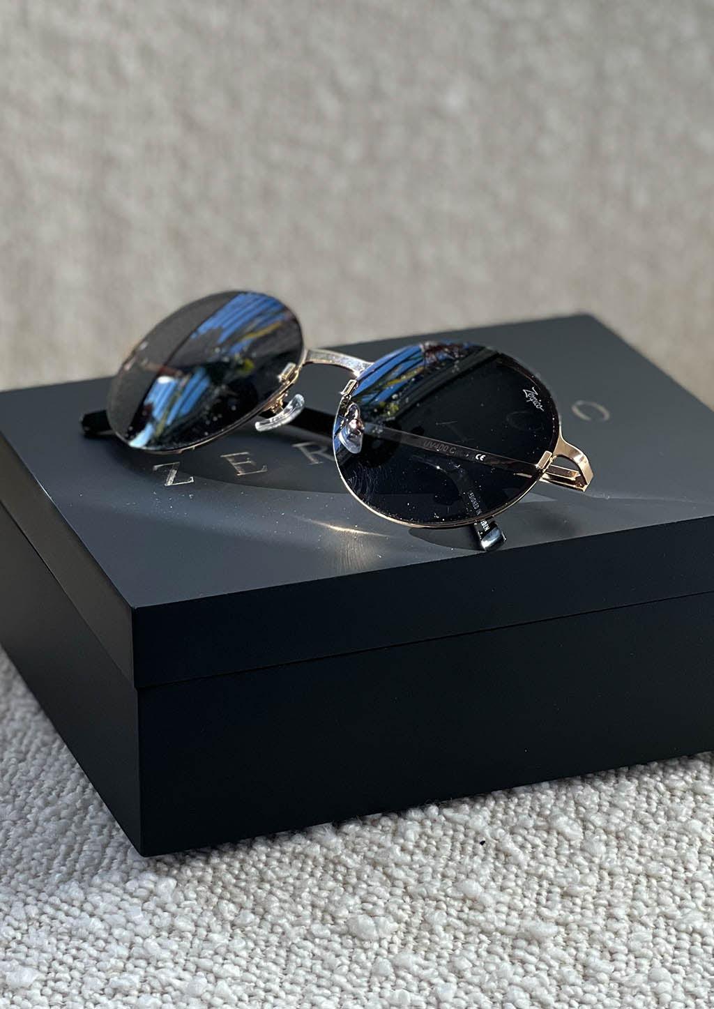 Titan - Titanium Round Sunglasses V2 - 24K Gold Plated with real gold. Closeup with the box.