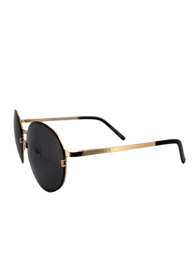 Titan - Titanium Round Sunglasses V2 - 24K Gold Plated with real gold. Studio shoot from the side.