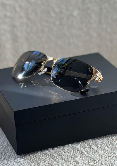 Titan - Titanium Wayfarer Sunglasses V2 - 24K Gold Plated with real gold. Closeup with our box.