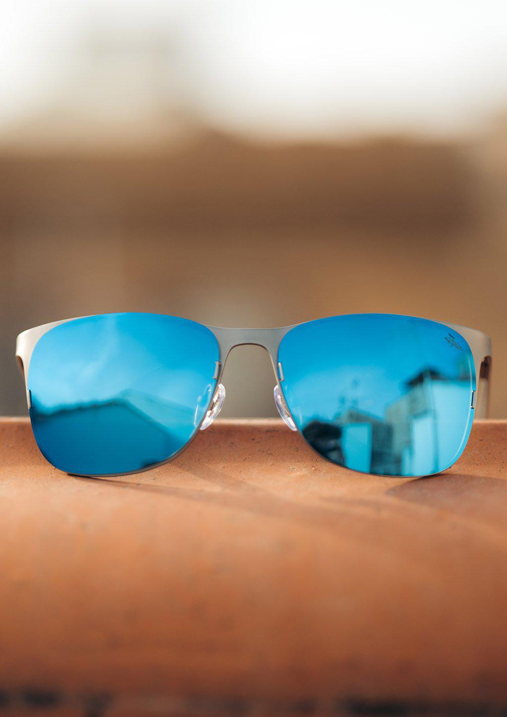 Titan - Titanium Wayfarer Sunglasses V2 - Close up of the front in gun metal with blue lenses.