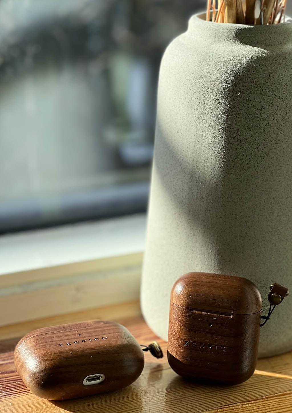 Zerpico Wooden Airpods case. Both cases display the walnut tree.