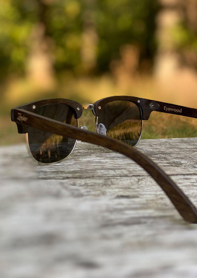 Eyewood Clubmasters is our cool take on classic model. This is Skyler with dark lenses. And also this model is made in all wood. Cool photo from the side.
