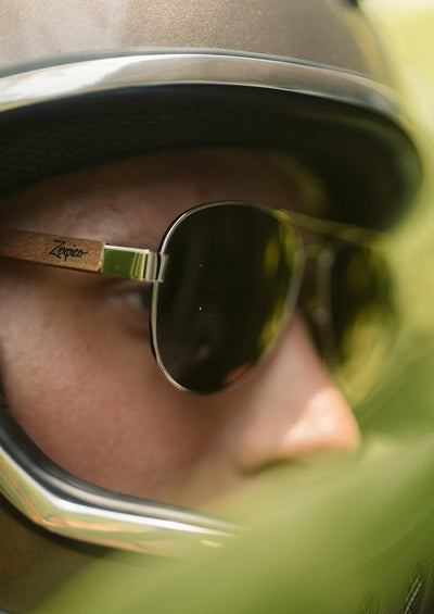 Eyewood Aviators - Falcon - Wooden sunglasses on model in a helmet.