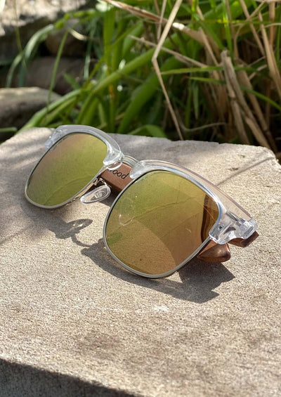 Eyewood Clubmaster - Haven - Our classic style with a modern take. Clear front with wooden temples and rose gold mirror lenses. Outside with details.