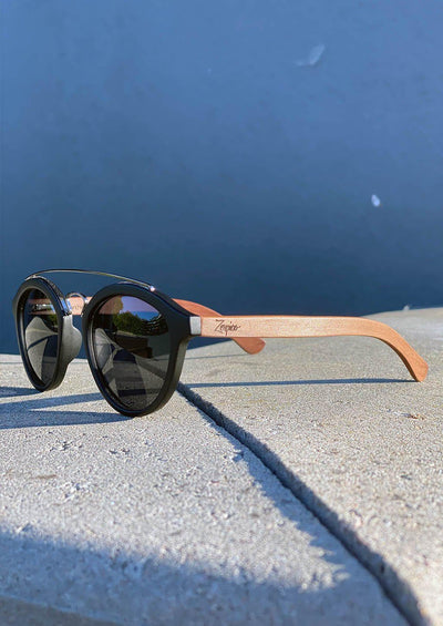 Handmade wooden round sunglasses that guaranteed to give you a natural feeling of comfort and design.  Lyric is a little bit special model of our round take on sunglasses. With some cool extra details. Outside in the sun.