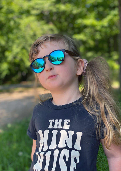 Eyewood Cubs - Lilo - Wooden sunglasses for kids and toddlers. On kid model in summer Sweden. On kid model in Sweden.
