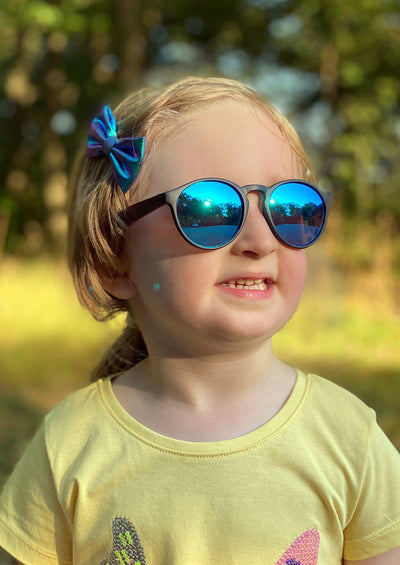 Eyewood Cubs - Lilo - Wooden sunglasses for kids and toddlers. On kid model in Sweden.
