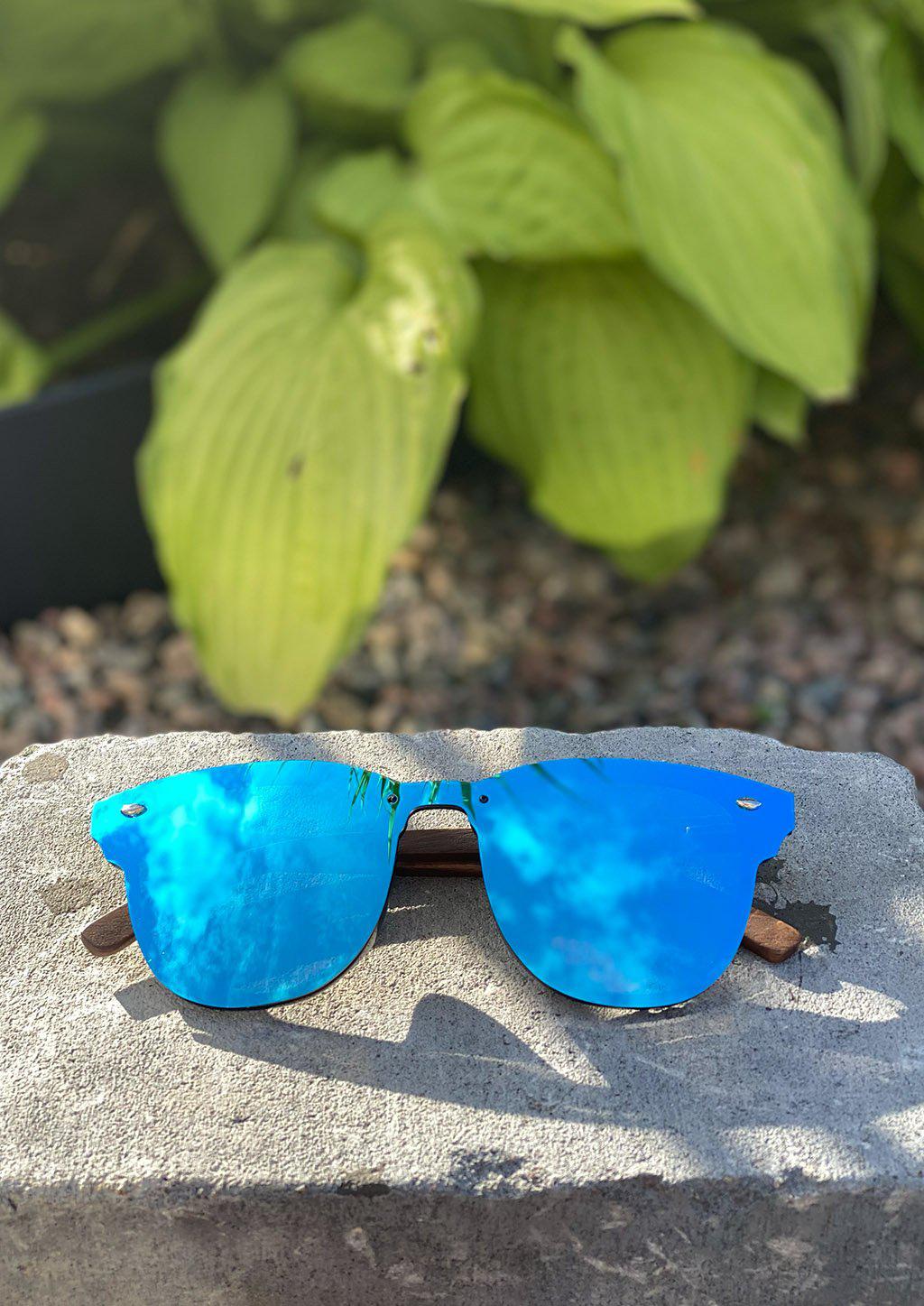 Eyewood tomorrow is our modern cool take on classic models. This is Delphinus with blue mirror lenses. With walnut wooden sides. Photo taken outside in the Swedish summer showing the nice blue mirror lenses.