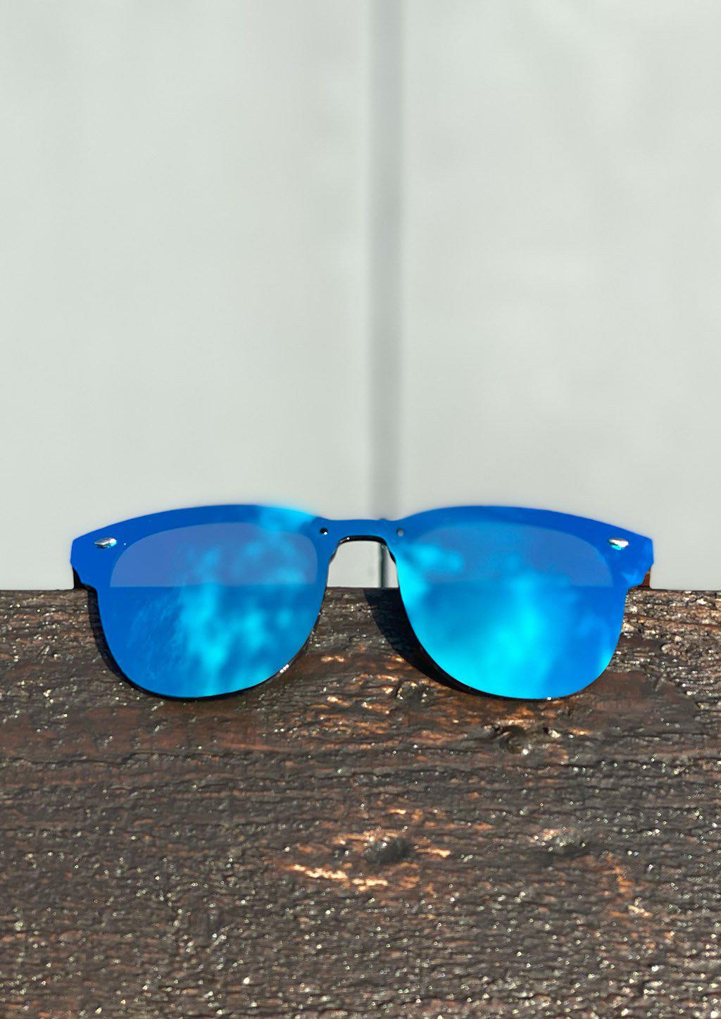 Eyewood tomorrow is our modern cool take on classic models. This is Delphinus with blue mirror lenses. With walnut wooden sides. Photo taken outside showing the cool blue colors.