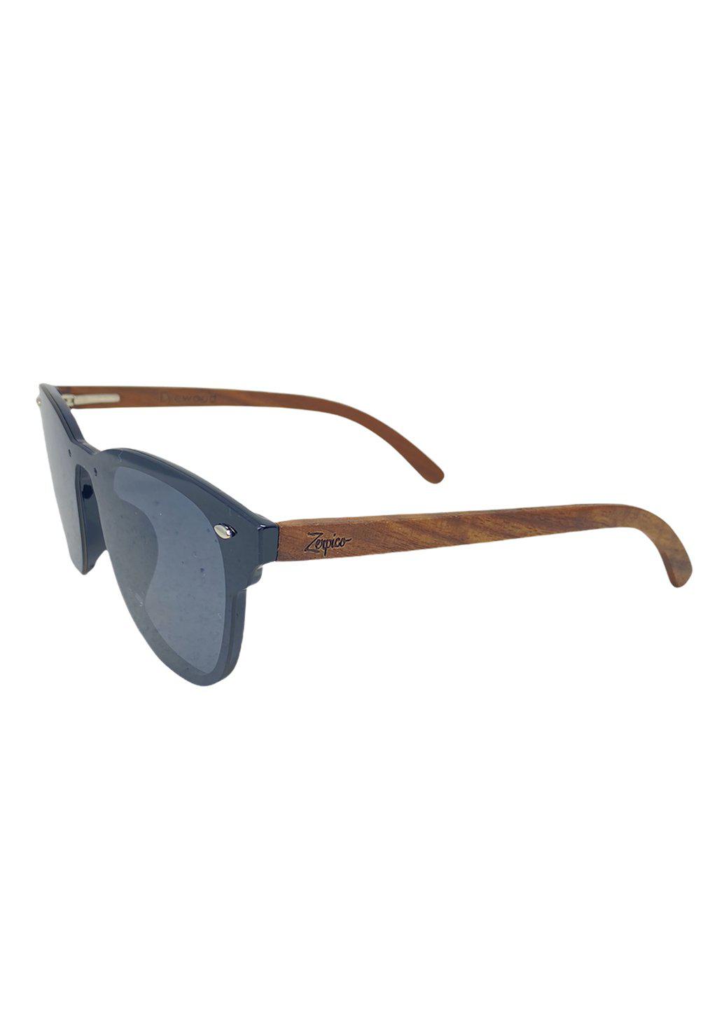 Eyewood tomorrow is our modern cool take on classic models. This is Fornax with black lenses. With walnut wooden sides. Studio shoot from the side.