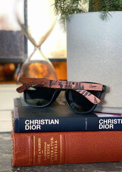 Engraved Wooden Sunglasses - The North lifestyle photo taken inside.