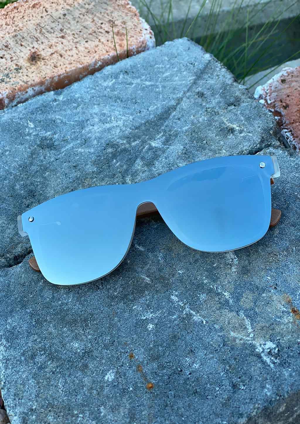 Eyewood tomorrow is our modern cool take on classic models. This is Perseus with silver mirror lenses. Nice wooden sunglasses outside in the sun from the front.