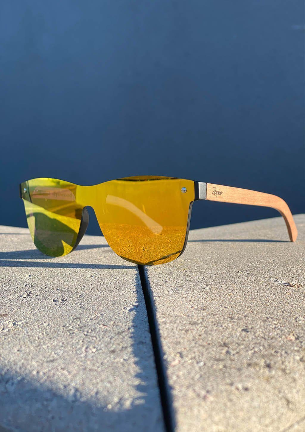 Eyewood tomorrow is our modern cool take on classic models. This is Scorpius with yellow mirror lenses. Nice wooden sunglasses outside in the sun in Sweden.
